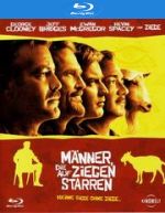 M�nner, die auf Ziegen starren